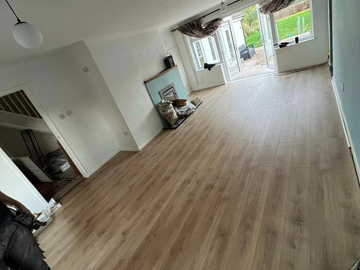 A renovated room with floorboards